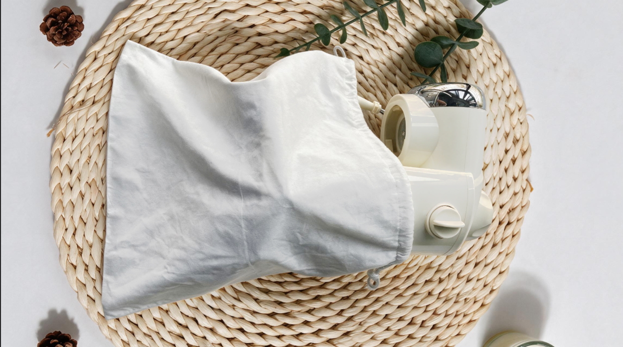 alt="Bamboo Fiber Compostable Drawstring Bag for Small Appliance Packaging with Moisture, Dust, and Stain Protection"