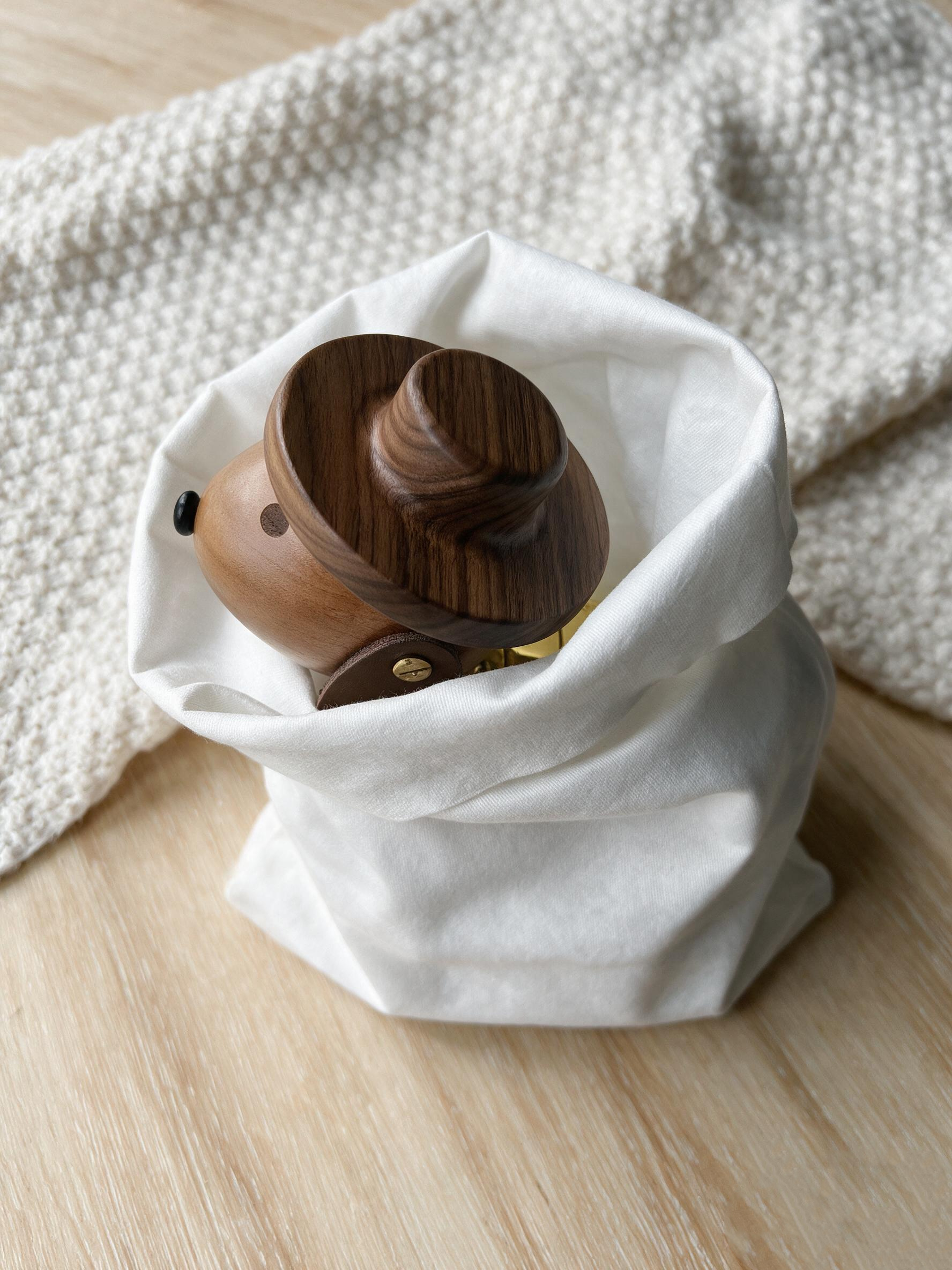 alt="Bamboo fiber compostable dust bag for wooden artwork packaging"