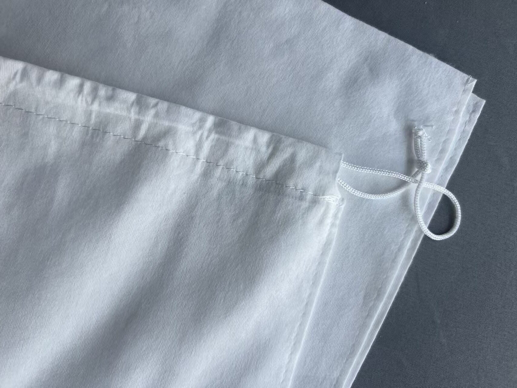 alt="Natural Texture Bamboo Fiber Compostable Bag for Premium Product Packaging"