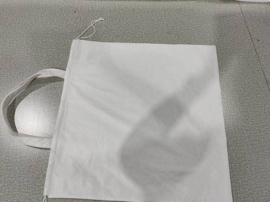 alt="Compostable Bamboo Fiber Drawstring Tote Bag for Luxury Handbag Packaging"